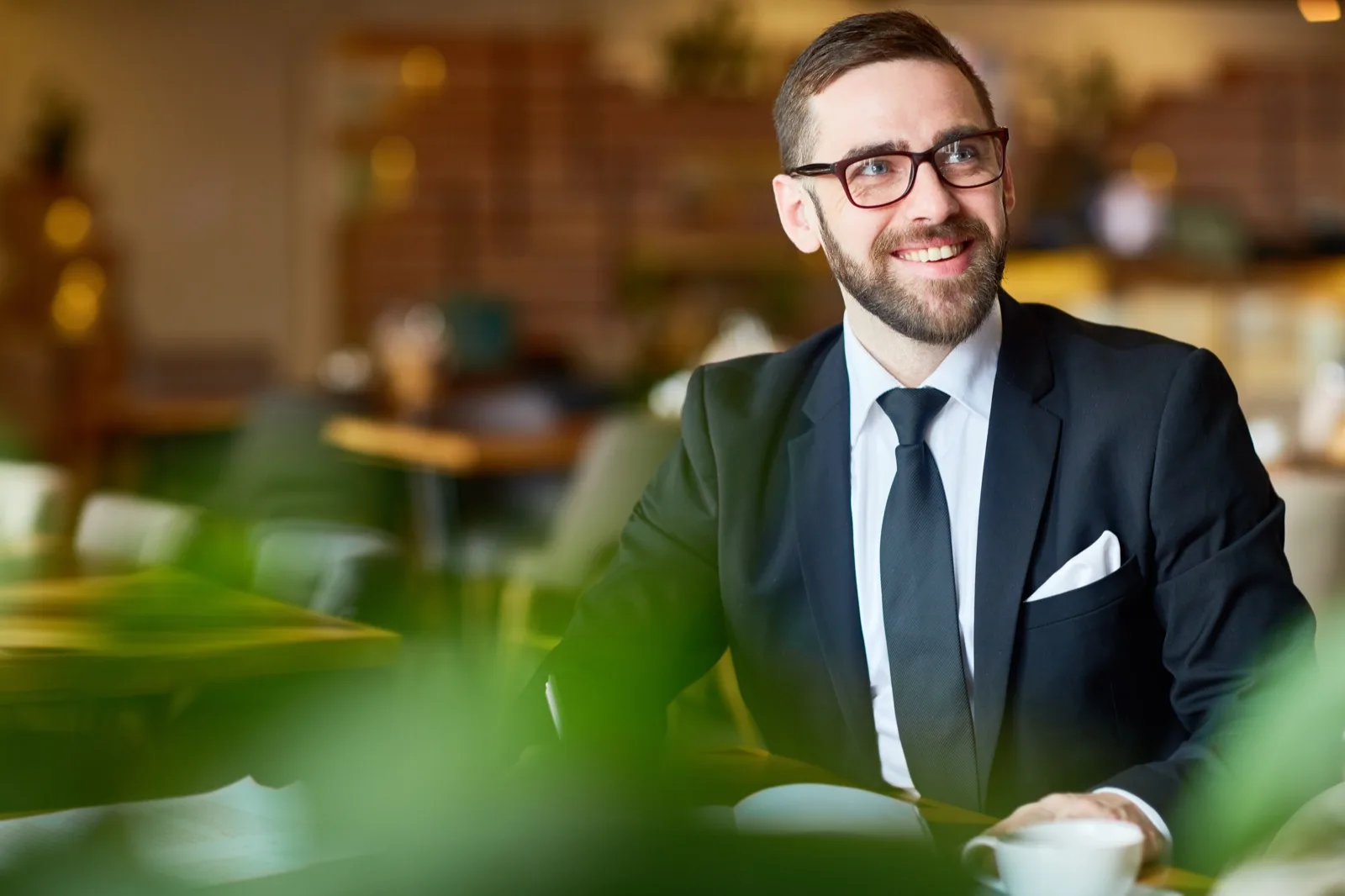 Thoughtful business leader reflecting in office setting